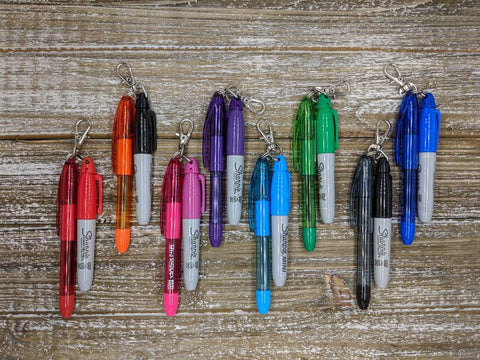 Mini Sharpies and Mini Pens in All Colors with a Keychain for Adding to a Badge Reel.